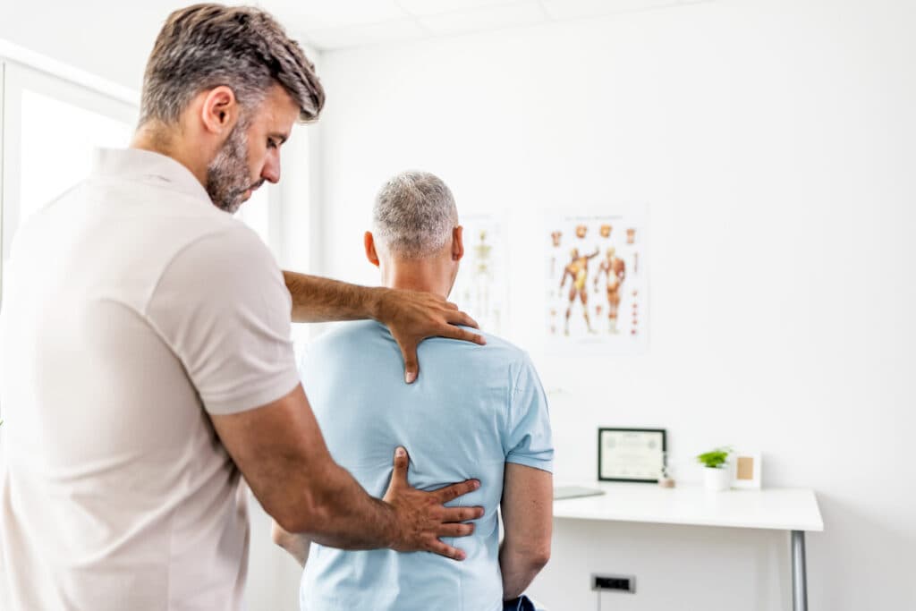 Chiropractor alignment session during the Kerala retreat